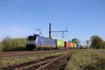 Beacon Rail 185 600 hauls an intermodal train near Diepholz on 23 April 2026.