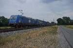 EGP 185 303 (ex-DB Cargo) hauls an intermodal train through D�lmen on 16 July 2026.