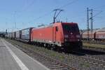 DB Cargo 185 216 hauls an intermodal freight through Neuwied toward Koblenz (and Italy?) on 30 April 2026.