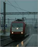 The Re 185 594-9 by a heavy shower in Spiez.
 29.06.2011