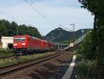 Electric locomotives 185314-2 and 185213-6 pull an ore train, at 11.8.2011 on the right Rhine track, at Rheinbreitbach, heading south.