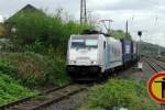 Metrans 186 181 speeds through Oberhausen Osterfeld Sd on 9 April 2014.