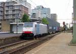 Railpool 186 251 speeds through Tilburg on 22 May 2014.