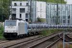 Steel train with Railpool 186 455 passes through Köln Süd on 4 October 2017.