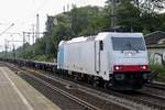 LOTOS Kolej 186 137 hauls an empty intermodal train through Hamburg-Harburg on 25 September 2014.