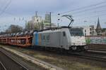 Lineas 186 455 hauls a Ford car train through Köln West on 15 february 2024.