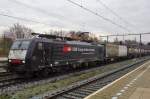 MRCE/SBB 189 288 passes through Boxtel on 28 November 2014.