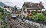 The SBB NOVELIS  Re  189 990-5  Göttingen  (ES 64-F4-90 / UIC 91 80 6189 990-5 D-Dispo Classe 189VE) with his Novelis Train on the way to Göttingne by Montreux.