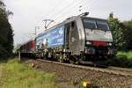 On 29 August 2014 TX Log 189 281 hauls an overnight train through Kaldenkirchen and passes the photographer at a railway crossing.