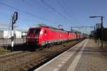 Coal train headed by 189 823 passes through Oisterwijk on 24 February 2021.