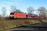 DBC 189 036 hauls a train of automotives through Boxtel on 24 February 2021.