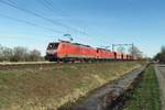 DBC 189 085 heads a double headed iron ore train through Boxtel on 24 February 2021.