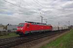 DBC 189 822 hauls a lime train through Venlo toward the Dutch-german border on 8 April 2021.