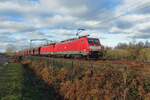 DBC 189 089 passes through Tilburg-Reeshof with an iron ore train on 8 December 2021.