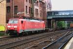 On 1 June 2012 DB 189 012 hauls a partially empty container train through Hamburg-Harburg.