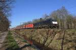 MRCE 189 094 hauls a coal train through Tilburg Oude Warande on 8 March 2022.