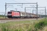 On 28 July 2022 DBC 189 077 hauls a block train of closed wagons through Valburg.