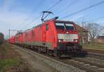 DB 189 027 hauls a coal train through Blerick on 15 February 2023 with some very new wagons (like the first three in the train).