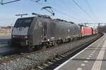 Black DBC 189 096 hauls an empty iron ore train through Blerick on 15 February 2023.