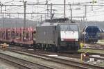 DBC 189 092 stands with an empty car carrying train at Amersfoort on 20 February 2023.