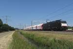 DB 189 095 hauls the Flandersbach lime train through Valburg on 16 June 2023.