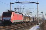 Hauling a train of closed wagons, DBC 189 086 passes through Hulten on 19 January 2024.