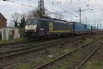 LKW Walter celebrates her first centenary with some trailers carrying celebrative text, one of which is seen in second position on this train, leaving Emmerich on 16 March 2024 with Ecco rail 189 285 at the reins.