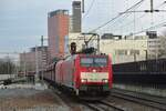 DBC 189 086 hauls a diverted empty iron ore train through Tilburg toward Rotterdam on 18 March 2018.