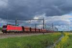 DB Cargo 189 041 hauls the emopty stock of an iron ore train through Valkbnurg on 18 April 2024.