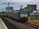 On the evemning of 29 July 2018 TXC Log 189 108 hauls a container train through Tilburg -but not via Track 1, that normally is used for passing south bound freight trains.