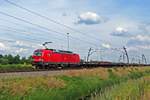 Empty steel train hauled by 193 359 speeds through Valburg on 3 June 2020.
