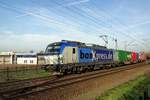 BoxXpress newby 193 537 hauls a container train through Venlo toward Germany on 25 November 2020.