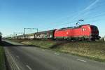 DBC 193 321 hauls a mixed freight through Boxtel on 24 February 2021.