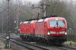 DBC 193 324 hauls a sister loco into Dutch territory at Venlo-Vierpaardjes on 17 December 2021.