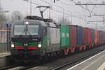 ELL 193 280 hauls the Neuss container train through Blerick on 16 December 2021.