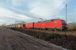 DBC 193 333 hauls a container train through Tilburg-Reeshof on 22 December 2021.