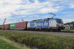 BoxXpress 193 836 hauls a container train through Valburg on 28 July 2022.
