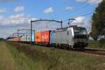 Brand new, so no markings: RFO 193 901 hauls the Gekkengraaf container shuttle train throguh Hulten on 21 August 2025.