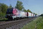 Adesso 193 181 hauls an intermodal train through Kaarst-Broicherseiote on 24 April 2026.