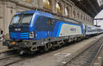 Electric locomotive 193 227,(91 80 6193 227-6 D-ELoc)  stands at the platform with its pantograph lowered shortly after arriving at Budapest Keleti station. May 8, 2026