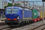 Electric locomotive X4 E 604 passes through the Linz station with a freight train. May 6, 2026