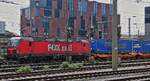 Electric locomotive 7193 194, operated by Fox Rail, pulls its freight train through Linz station. May 6, 2026