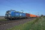 EGP 193 838 hauls a containertrain through St.H�lfe (near Diepholz) on 23 April 2026.