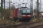 SBBCI 193 701 slowly crawls out of Emmerich into the Netherlands on 16 March 2024.