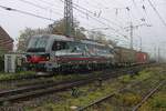 Misty! SBBCI XLoas 193 542 pops up out of the fog at Emmerich with a Kijfhoek bound container train on 23 October 2024.