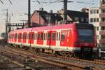 S-Bahn 423 035 is about to call at Köln Hbf 24 March 2017.