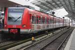 Carnival is over, but DB 423 557 still carries karneval livery at Köln Hbf on 15 February 2024.