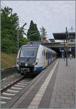 In the opposite direction, the DB Stuttgart S-Bahn train 430 716 is on its way. In Echterdingen, the train is almost at the end of its journey, Stuttgart Airport.

July 8, 2026