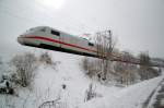 401 077-3 between Amstetten and Urspring, February 13th, 2009.