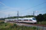 Some days after the inauguration of the new high speed track, a DB ICE is running through Grnhaut forest (B) towards Frankfurt-on-Main.